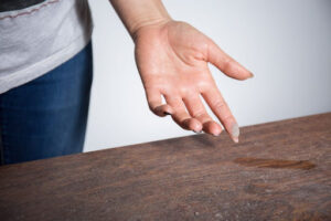 A close-up of a hand and dust.